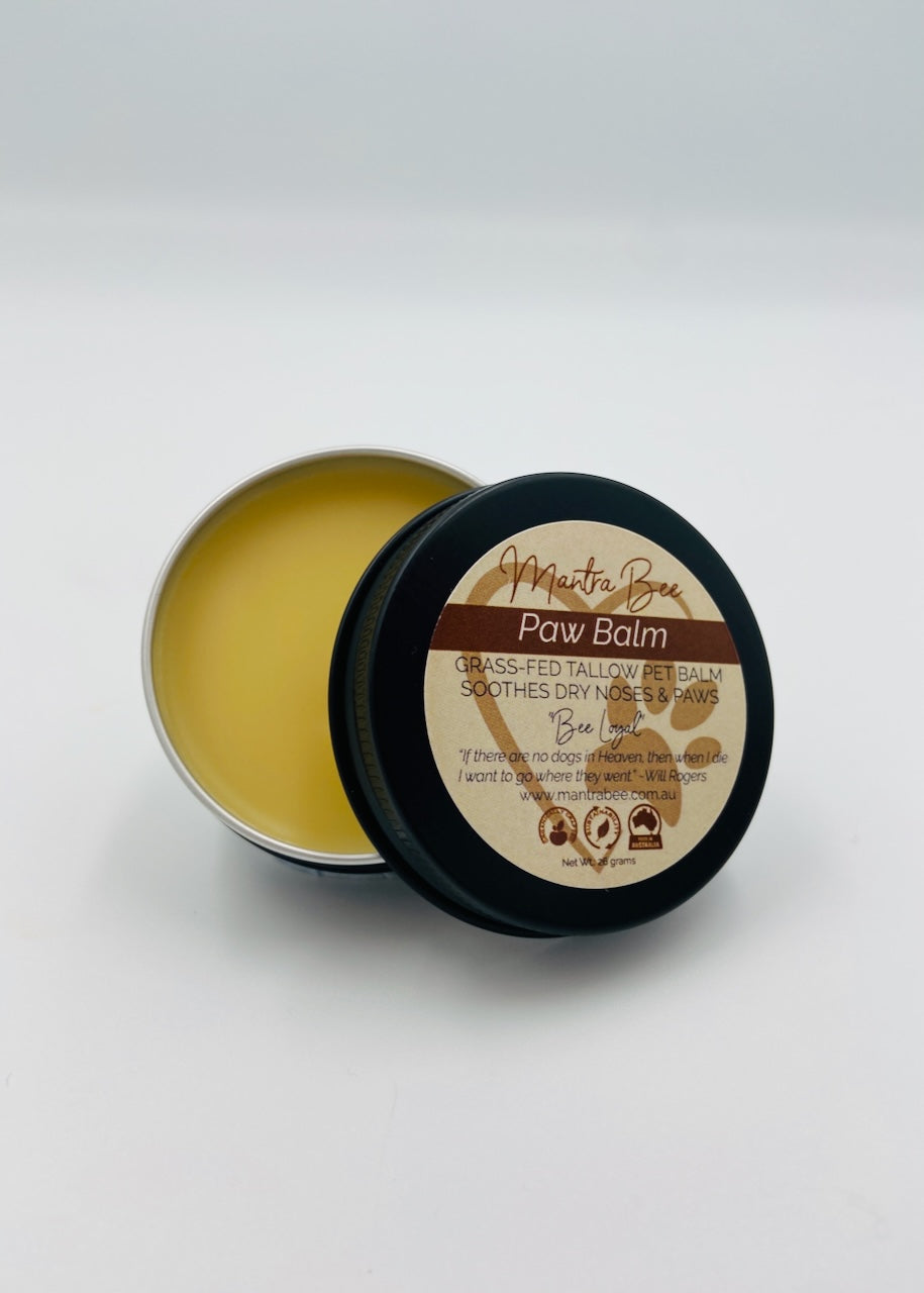 Paw balm container with open lid on a white background